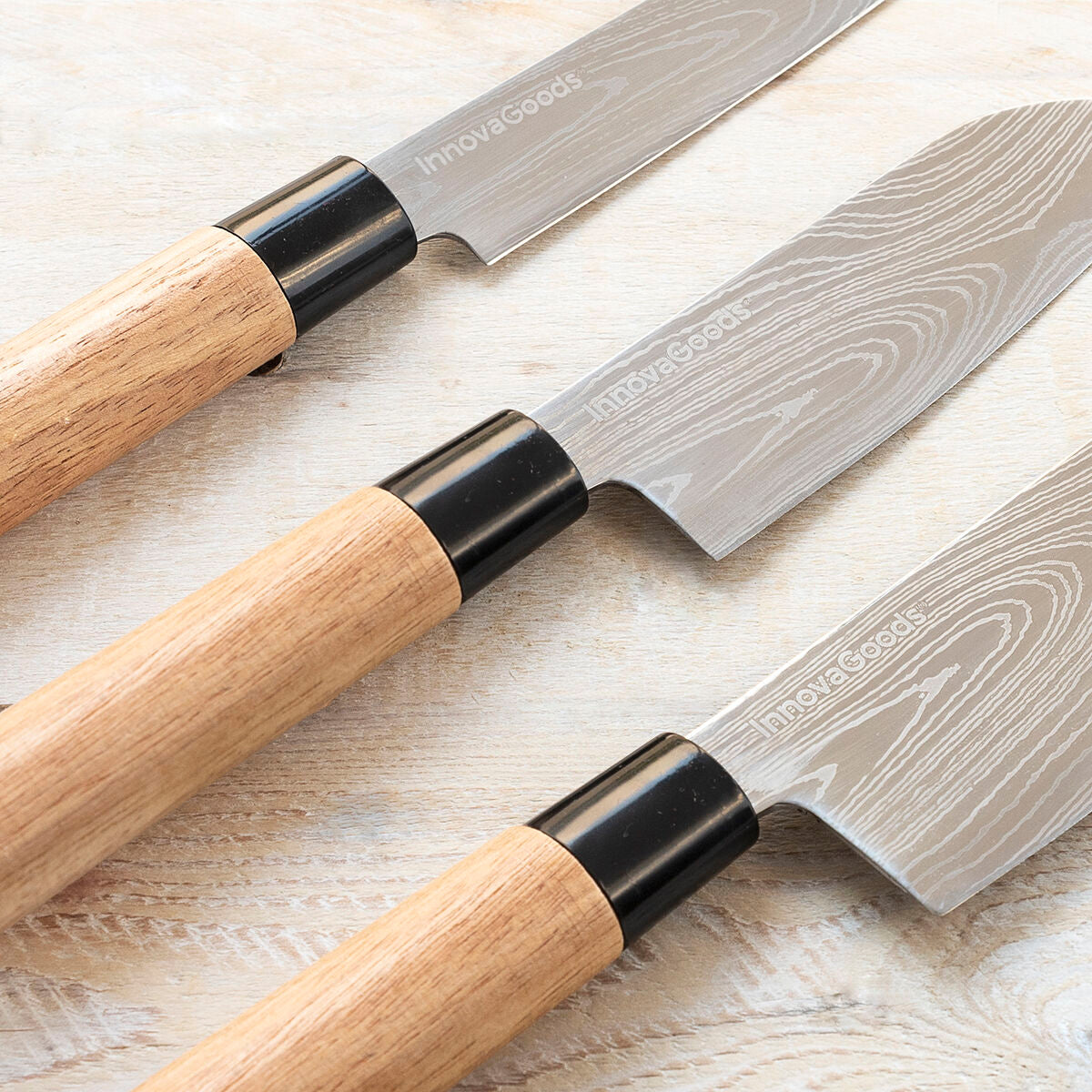 Lames du lot de 3 couteaux Pro Innovagoods sur planche